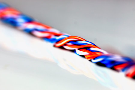 Multicolored computers wires and tv isolated on white backgroundの写真素材