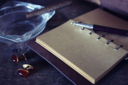 Vintage objects on old wooden shabby retro background conceptの写真素材