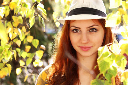 Pretty cute girl walks in the park on a sunny dayの写真素材