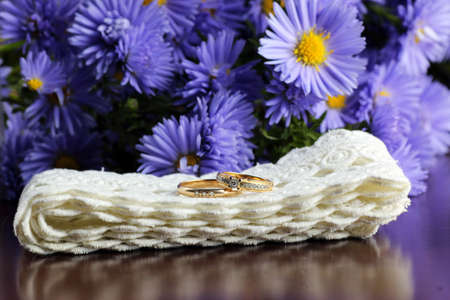 Wedding accessories in combination with a bouquet of wild flowersの写真素材