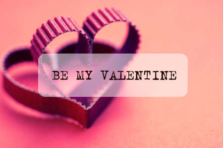 decoration with a symbol of warmth and love of a small paper heartの写真素材