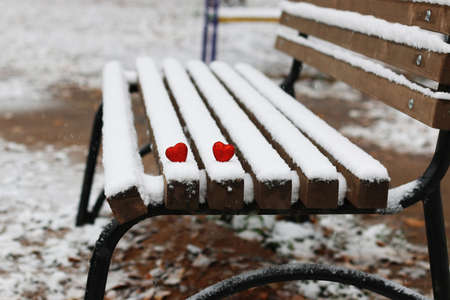 Snowy day shape of hearts red color in winter dayの写真素材