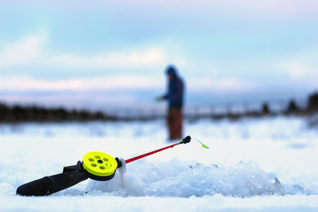 Men's winter fun hike to the pond on the ice-fishing