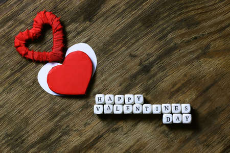 decoration with a symbol of warmth and love of a small paper heartの写真素材