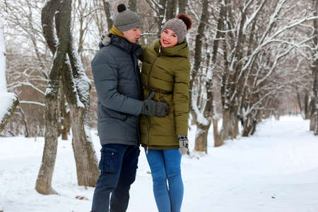 young student in a winter landscape on a sunny nice dayの写真素材