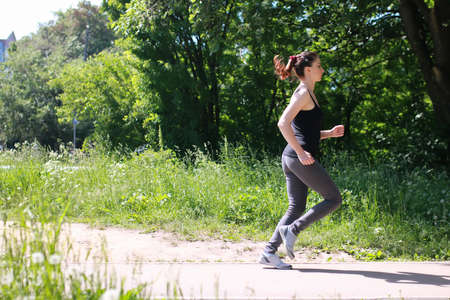 handsome and attractive person in the summer goes on city streetsの写真素材