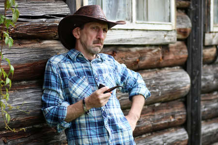 textured very old man with a straight face in the form of a player from the ranchの写真素材