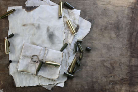 many shell casings from bullets of different caliber in the background chaos concept in the worldの写真素材