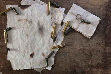 many shell casings from bullets of different caliber in the background chaos concept in the worldの写真素材