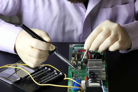 technology engineer of the modern world in a workflow with electronic devicesの写真素材