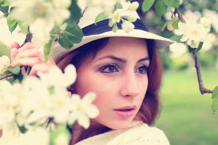 handsome and attractive person in the summer in the landscape of city streets and parksの写真素材