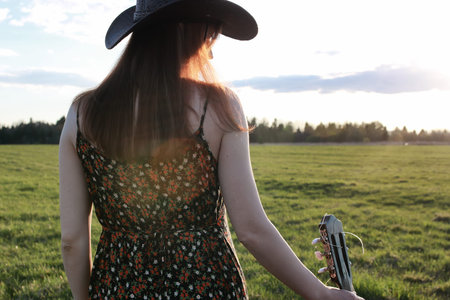 handsome and attractive person in the summer in the landscape nature and parks