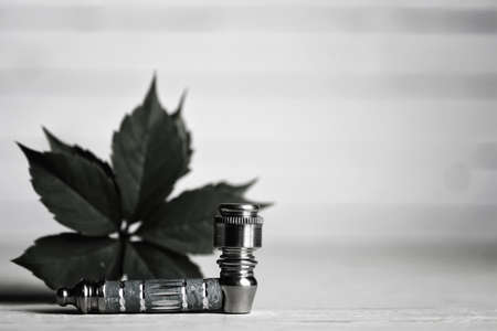 marijuana pipe on wooden backgroundの写真素材