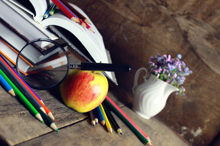 education book apple and magnifying glassの写真素材