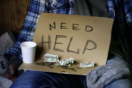 homeless man ask helpの写真素材