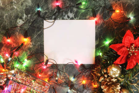 christmas background empty blank paper and decoration with garlandの写真素材