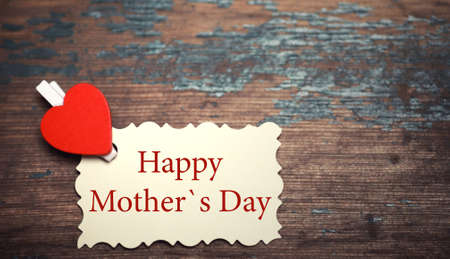 old white sheet of paper love notes with text and heart shapeの写真素材