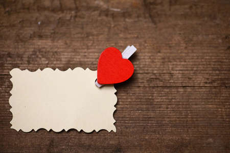 white sheet of paper love notes and heart shapeの写真素材