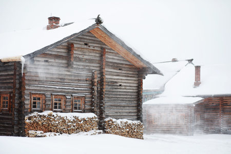 retro wooden house in the forest in russian northの写真素材