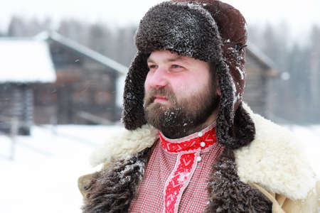 Traditional winter costume of peasant medieval age in russiaの写真素材
