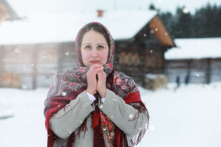 young girls in traditional costumes of the Russian north in wintの写真素材