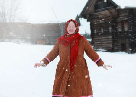 young girls in traditional costumes of the Russian north in wintの写真素材