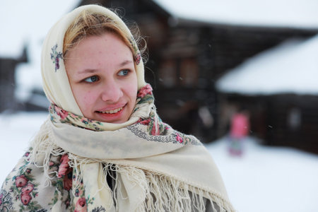 young girls in traditional costumes of the Russian north in wintの写真素材