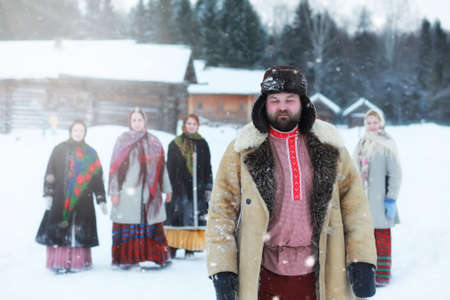 Traditional winter costume of peasant medieval age in russiaの写真素材