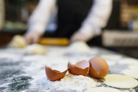 different ingredients for preparing flour products on the kitchen table