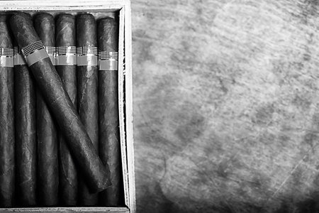 monochrome photo of large wooden box of cigars handmade Cuban production