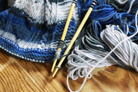wool and knitting needles basketの写真素材