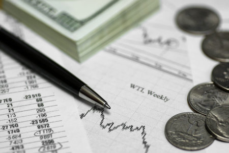 pen on paper with the price quotes and chartsの写真素材