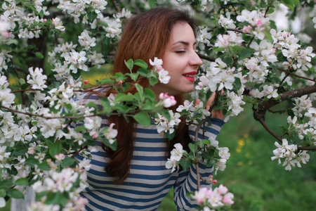 woman and flowers tree appleの写真素材