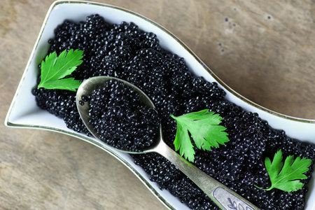 black caviar on a wooden backgroundの写真素材