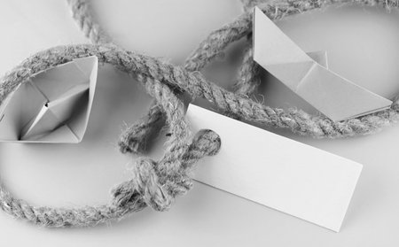 monochrome photo sticker with thick braided rope and ship paper
