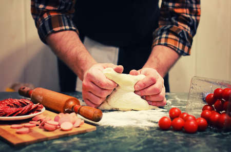 prepare dough pizza toppingの写真素材