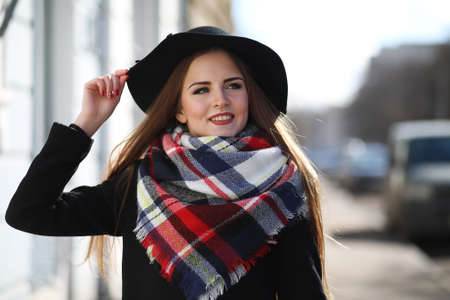 Girl on a walk in sunny weatherの写真素材