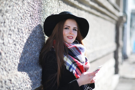 Girl on a walk in sunny weatherの写真素材