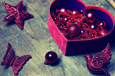 toned christmas red ball in a boxの写真素材