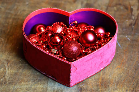 christmas red ball in a box shape heartの写真素材