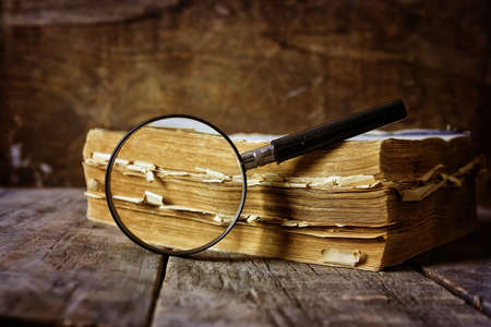magnifying glass and old bookの写真素材