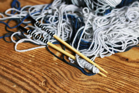 wool and knitting needles basketの写真素材