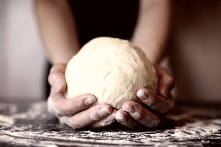 pizza prepare dough hand toppingの写真素材