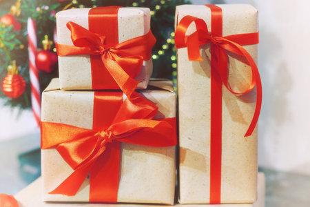 stack of gifts under a Christmas treeの写真素材