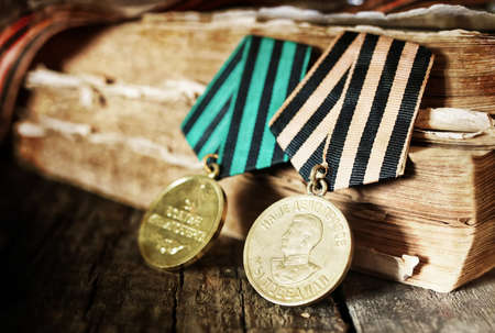 Awards of Merit in World War II by the Soviet Union on a vintage wooden backgroundの写真素材