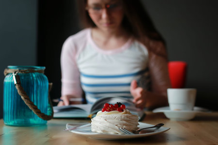 Girl in a cafe for a cup of coffee with the notebook