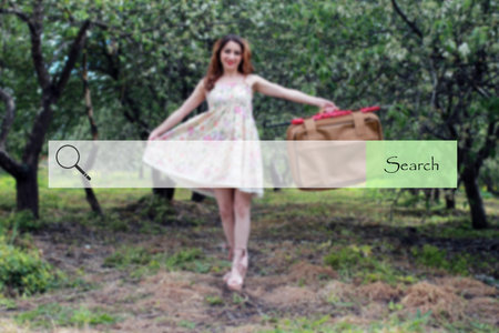 search bar on the background of blurred pictures spring girl witの写真素材