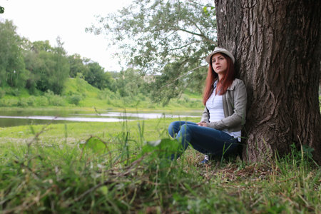 woman in tree park outdoor