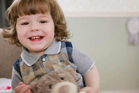 litle kid stand at bedroomの写真素材