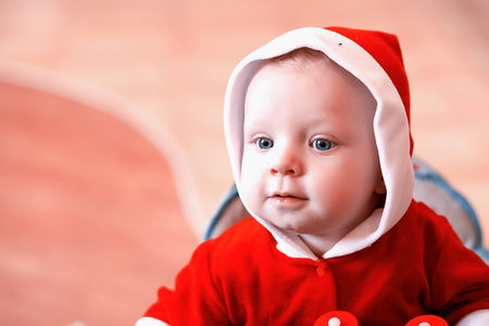 Portrait of a young blond child with blue eyesの写真素材